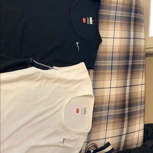 2 Nike Fit Dry sleeveless shirts for sale.